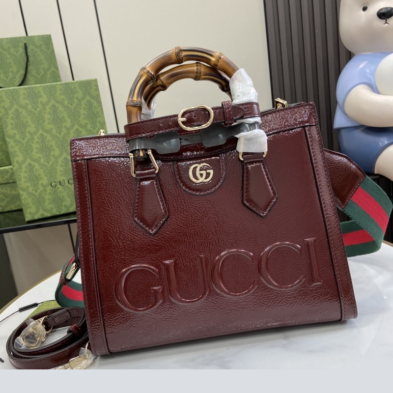 G*u*i top handle bags